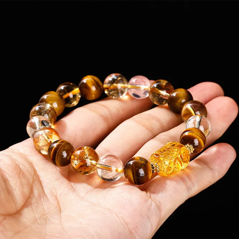 5A natural yellow tiger's eye and citrine bracelet with 10mm geometric beads and a beeswax pi xiu charm.
