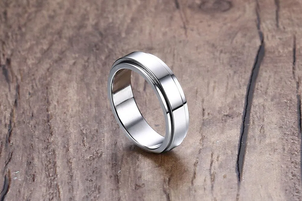 Rotatable geometric stainless steel ring in gold colour, unisex Korean style