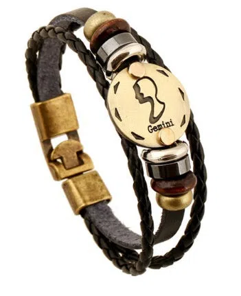 Leather constellation bracelet with metal zodiac sign, wood bead, and black gallstone on cowhide band