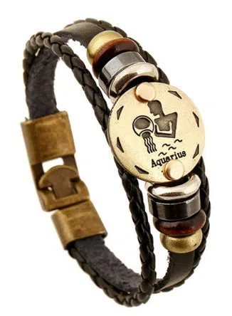 Leather constellation bracelet with metal zodiac sign, wood bead, and black gallstone on cowhide band