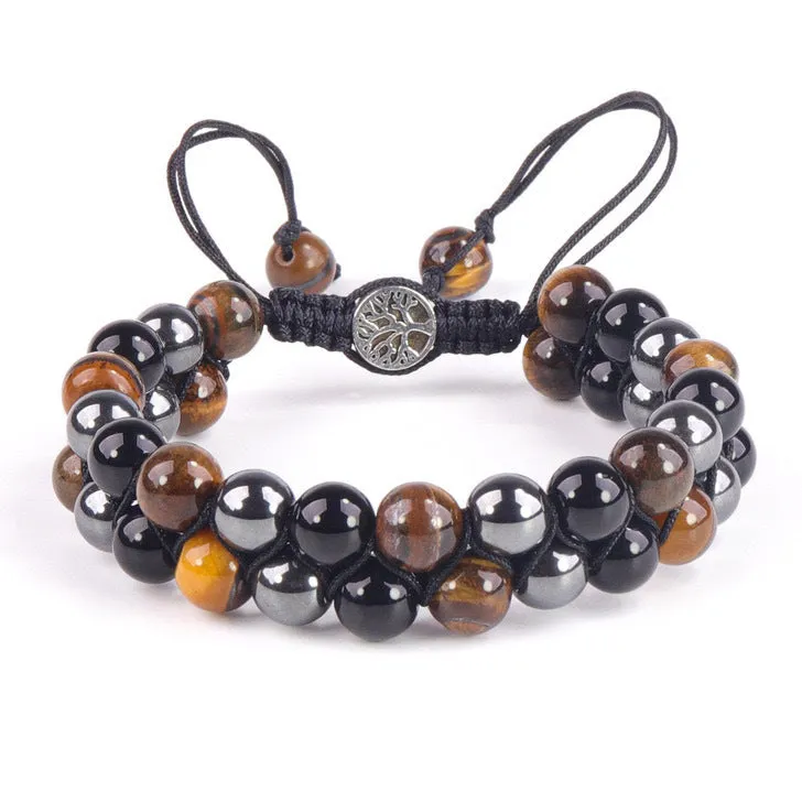 Men's black and gold tiger eye stone woven bracelet with magnetic clasp showing geometric pattern
