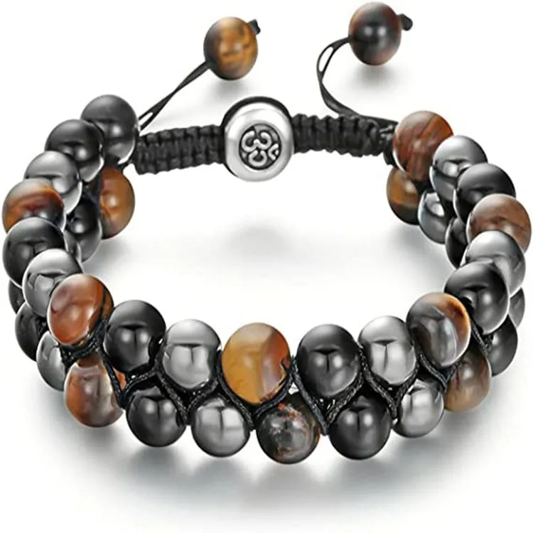 Men's black and gold tiger eye stone woven bracelet with magnetic clasp showing geometric pattern