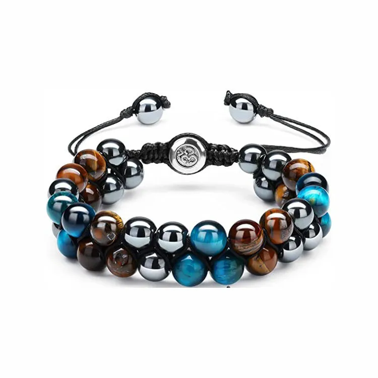 Men's black and gold tiger eye stone woven bracelet with magnetic clasp showing geometric pattern