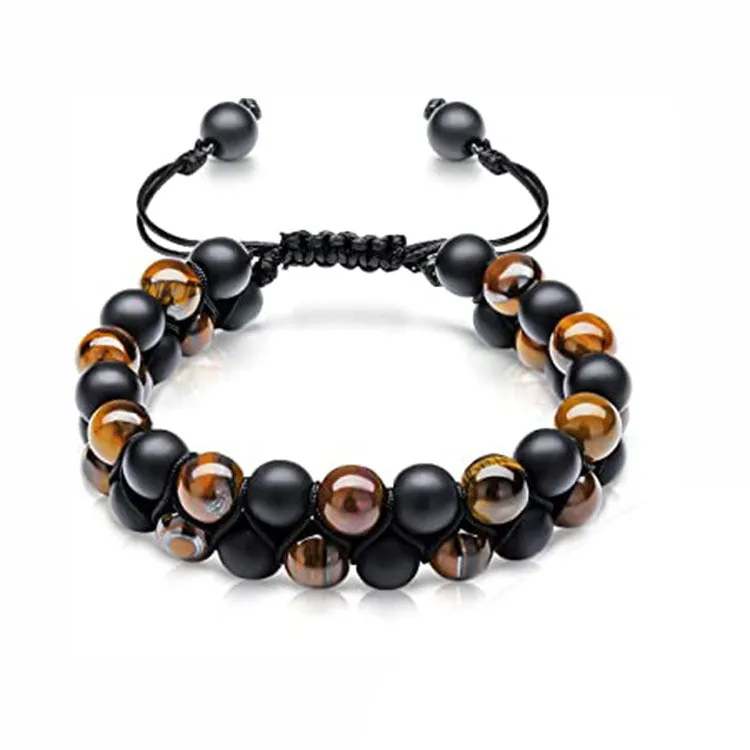 Men's black and gold tiger eye stone woven bracelet with magnetic clasp showing geometric pattern