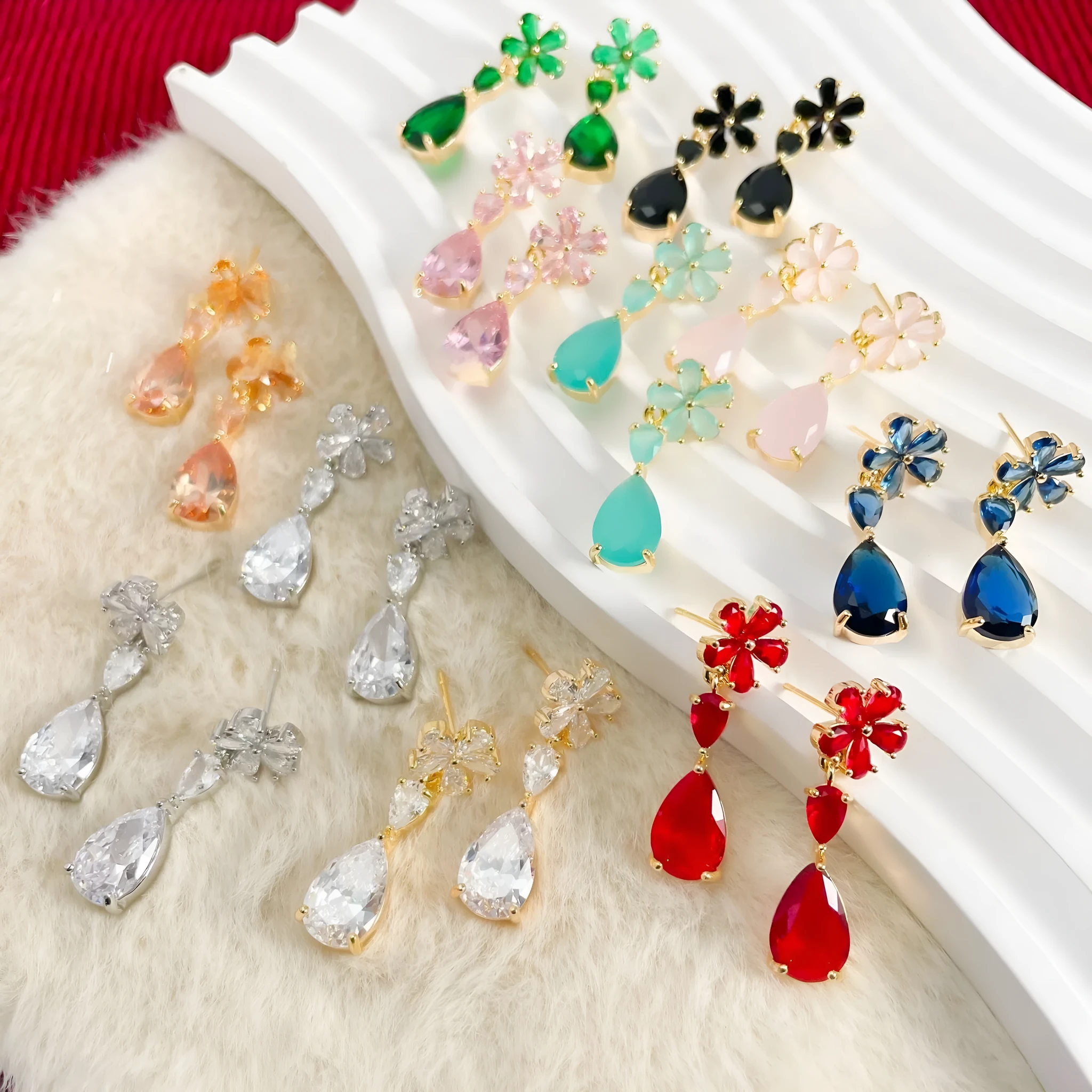 Copper stud earrings flower tassel design multi-colour electroplated geometric simple style on white background