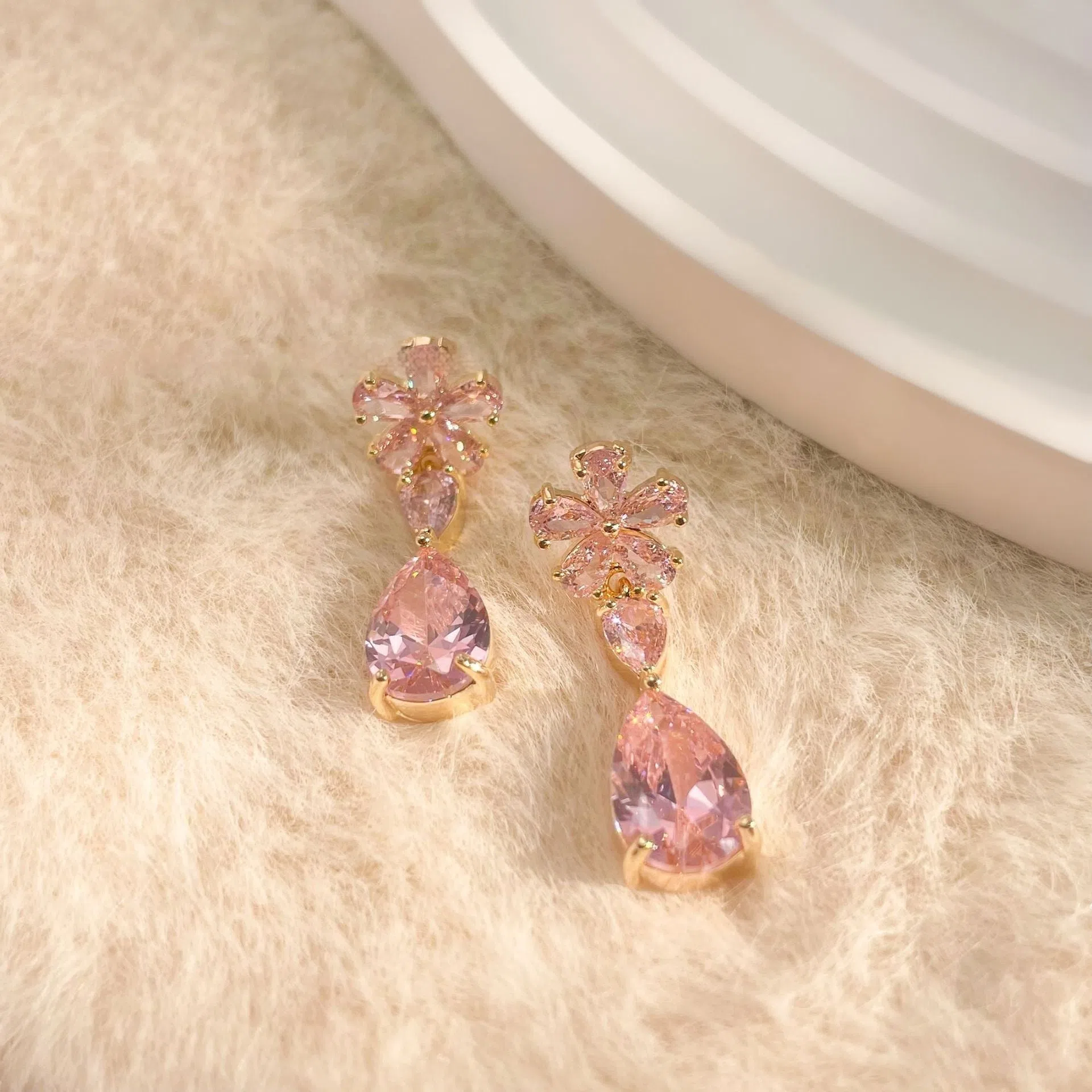 Copper stud earrings flower tassel design multi-colour electroplated geometric simple style on white background