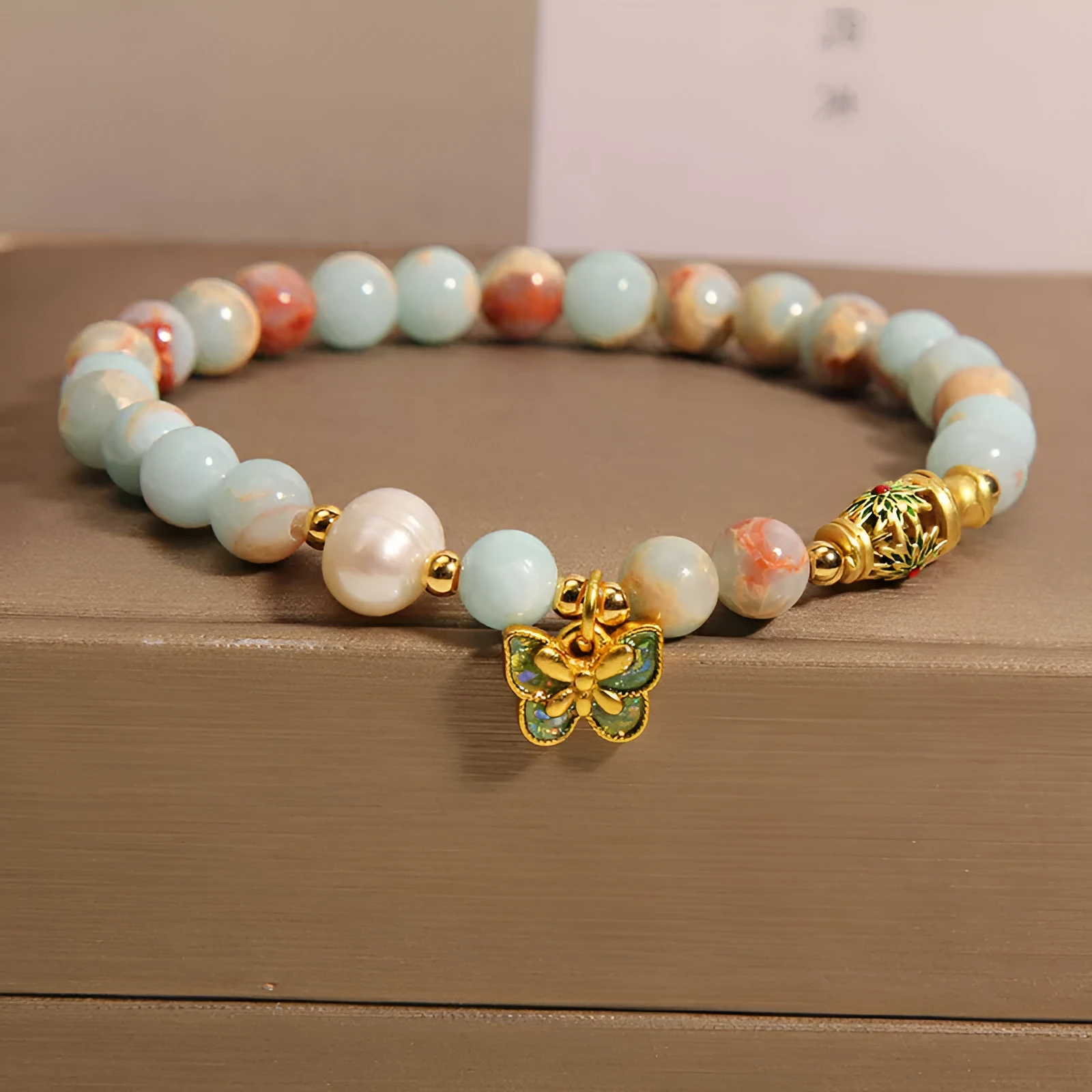 Blue women's bracelet with Shoushan stone and freshwater pearl butterfly pendant