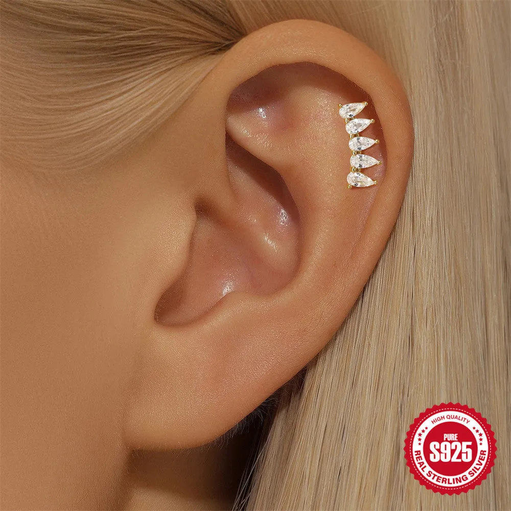 S925 sterling silver geometric earrings with a moon and embedded diamond star design in a gold-toned finish.