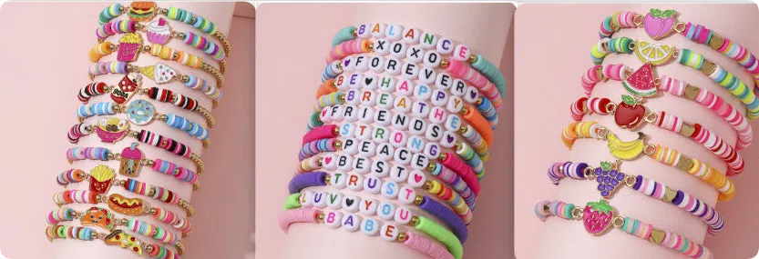Children's polymer clay bracelet with dinosaur bead theme on a white background