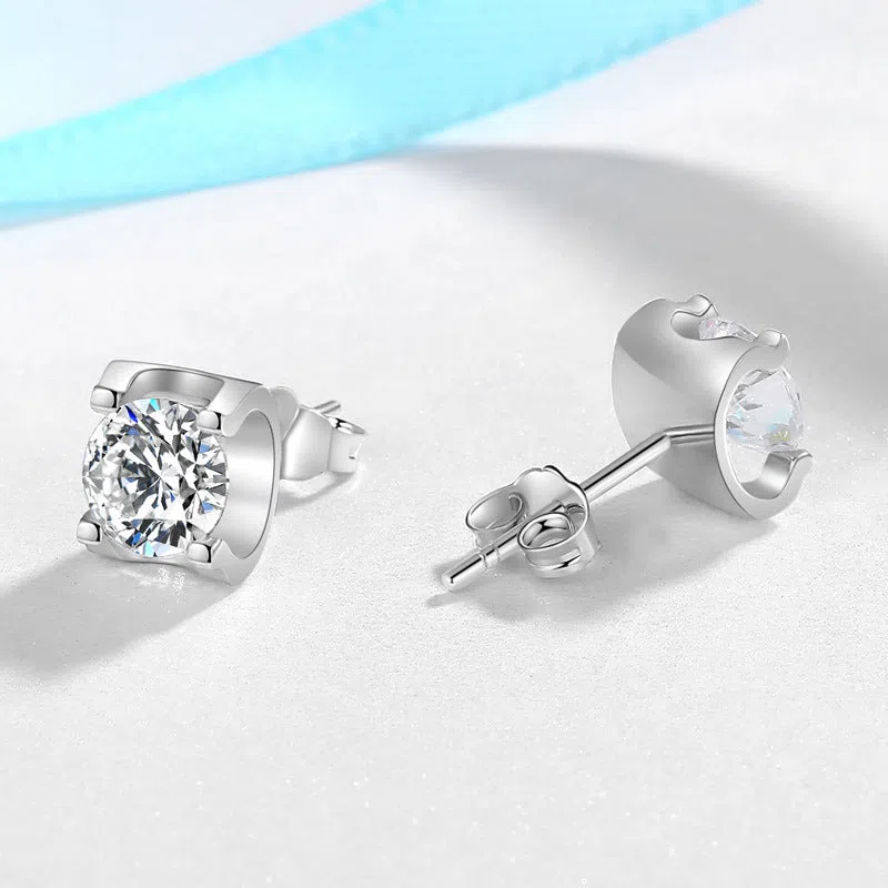 Bullhead artificial diamond women's stud earrings in platinum colour with geometric water-flow design