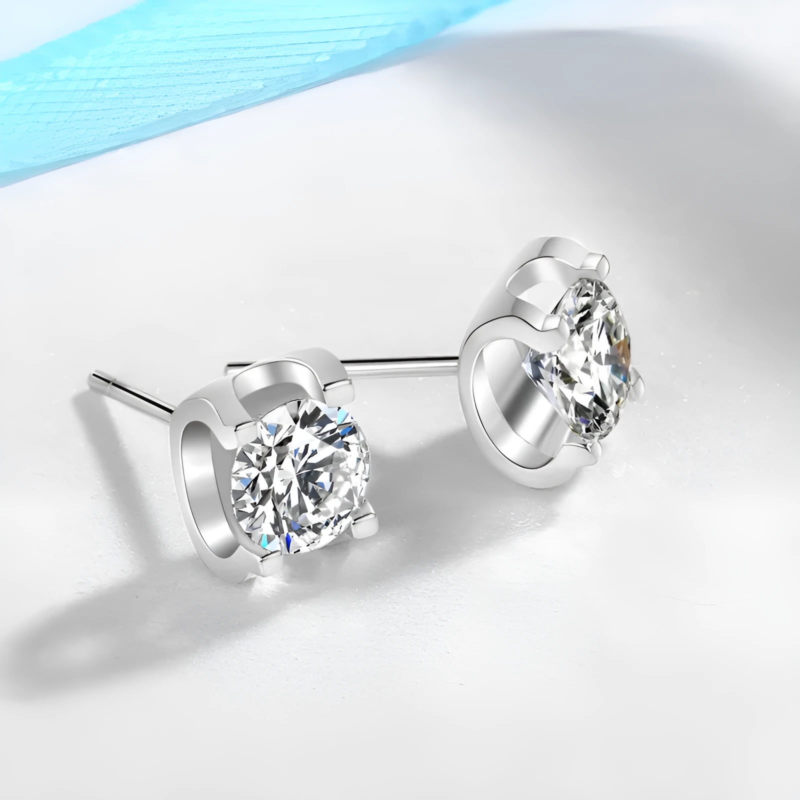 Bullhead artificial diamond women's stud earrings in platinum colour with geometric water-flow design