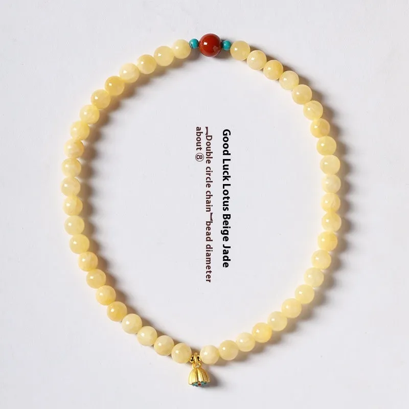 Handmade double ring bracelet for women with yellow jade and topaz stones in a retro design.