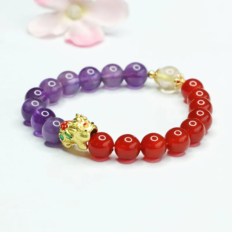 Purple amethyst and red agate beaded bracelet with Chinese style design on wrist