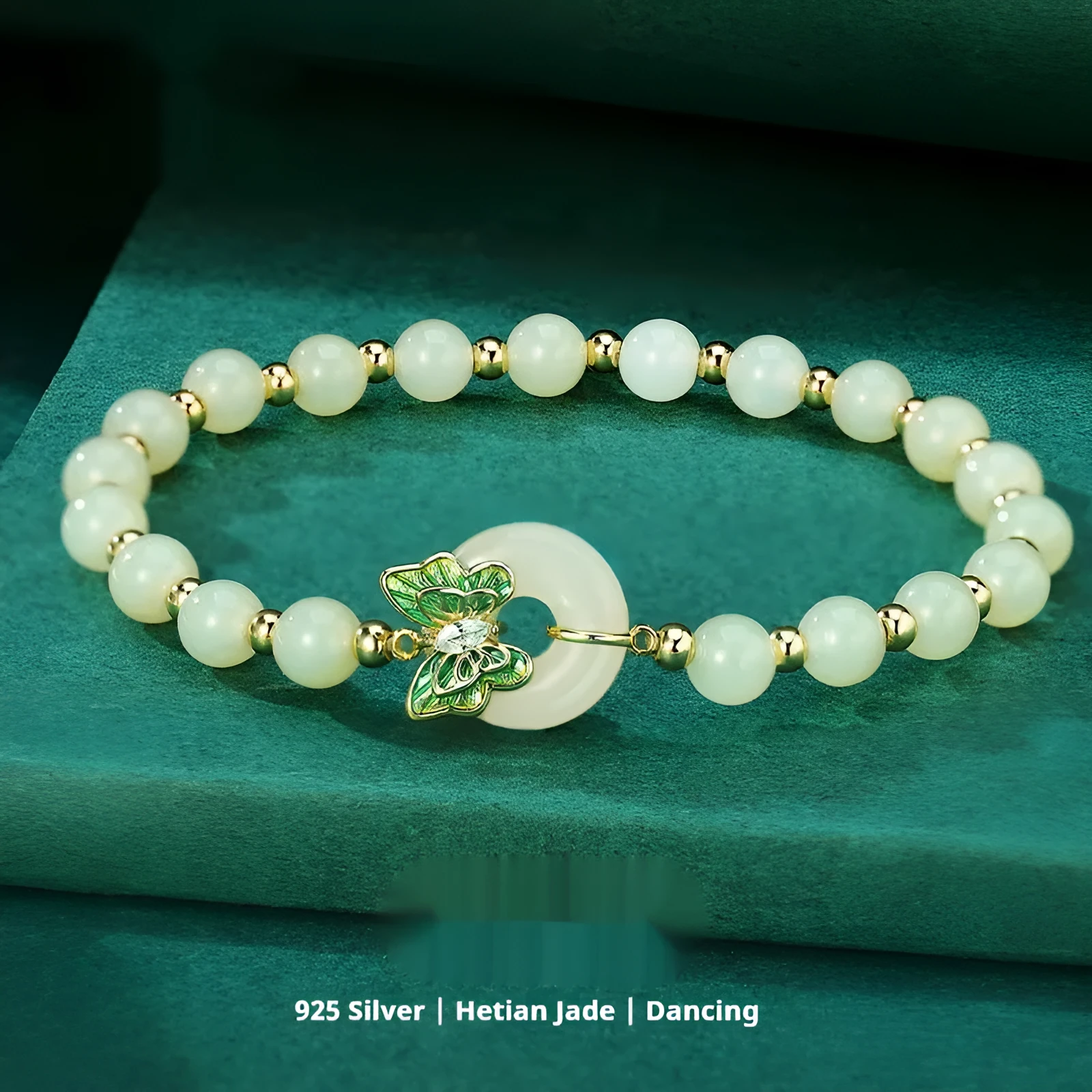 Cyan Hetian jade bracelet with sterling silver butterfly design and gemstone inlays on wrist