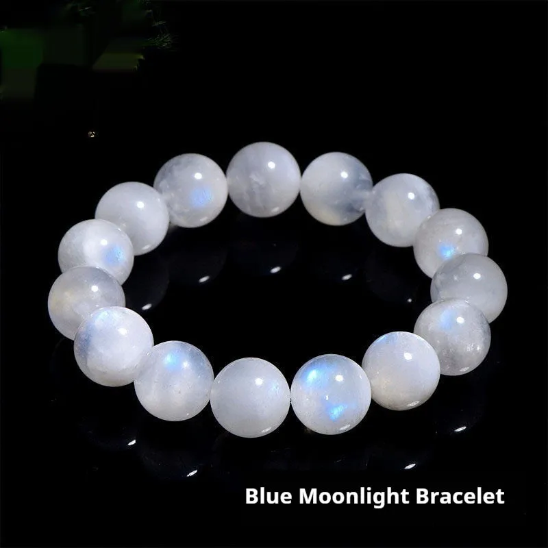 Natural white Moonstone round bead bracelet on a wrist, showing polished geometry beads.