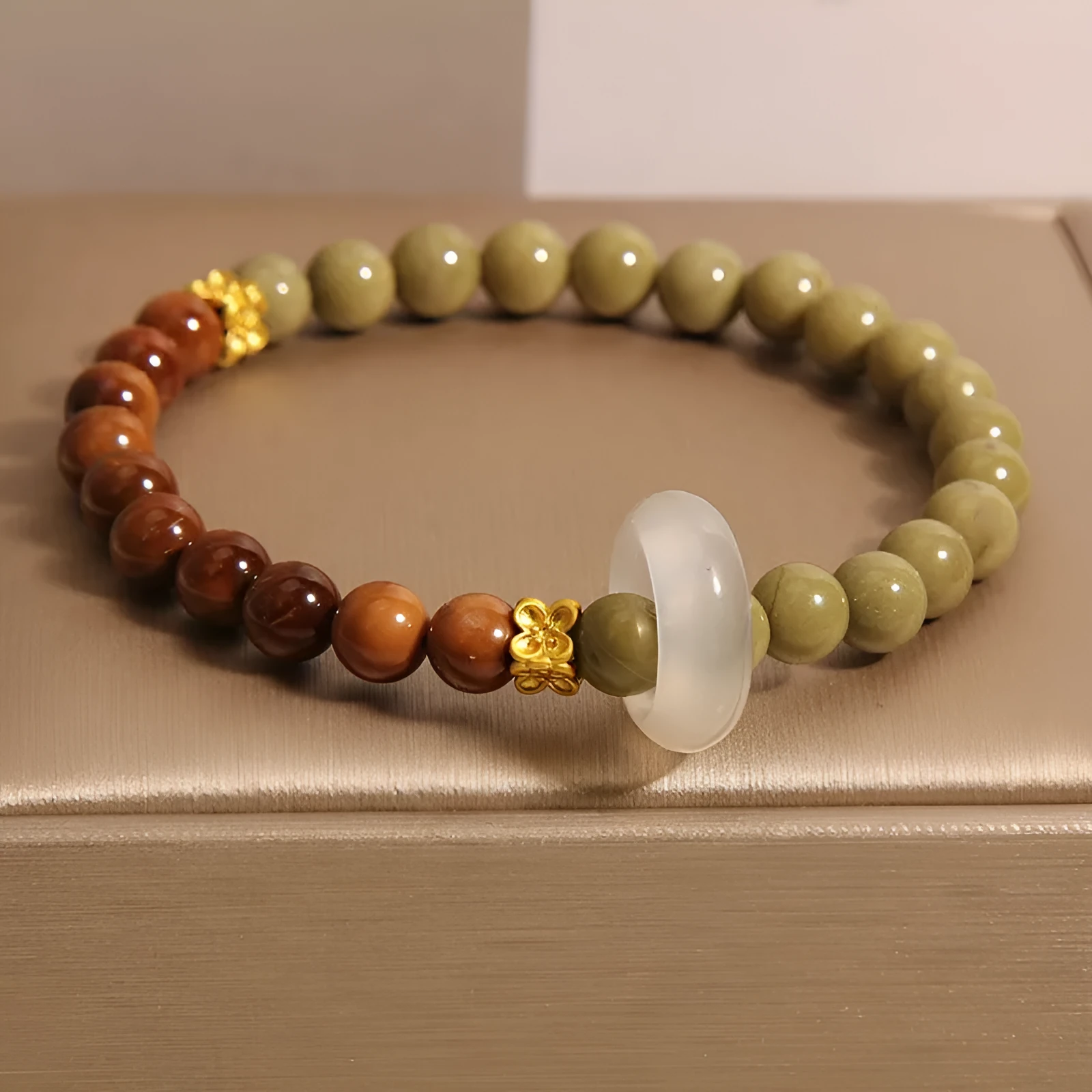 Green gradient women's bracelet with crown, diamond, and geometric shapes in a double ring new Chinese style design.