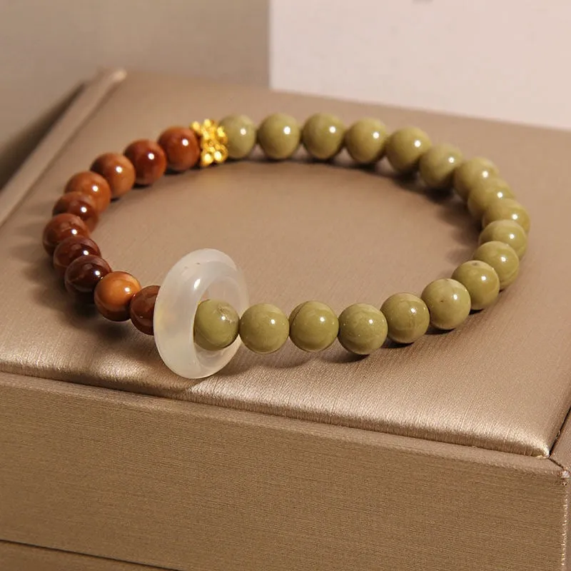Green gradient women's bracelet with crown, diamond, and geometric shapes in a double ring new Chinese style design.