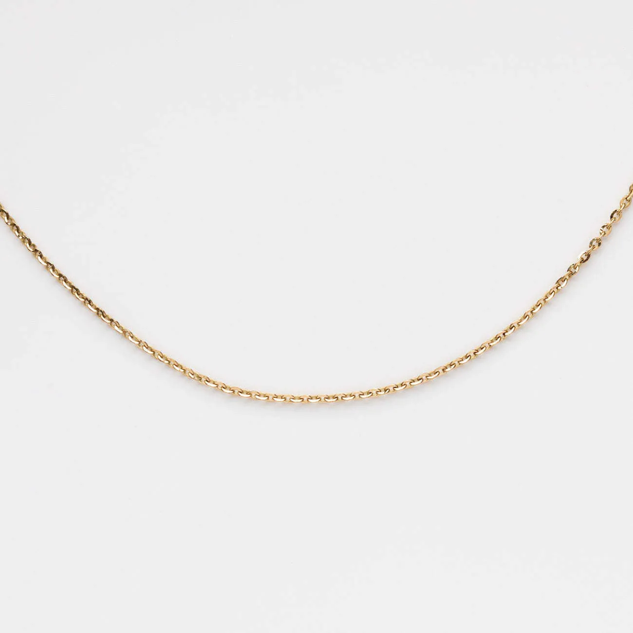 Geometric natural stone crystal pendant on an O-shaped chain necklace