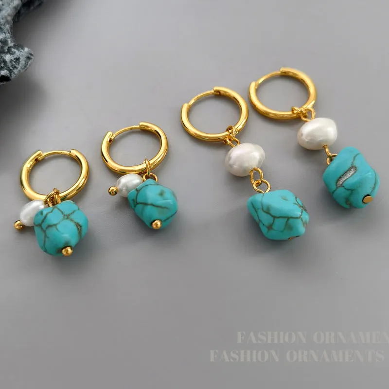 A pair of geometric copper ear clips with irregular turquoise stone and cultured pearls, showing both short and dangle styles.