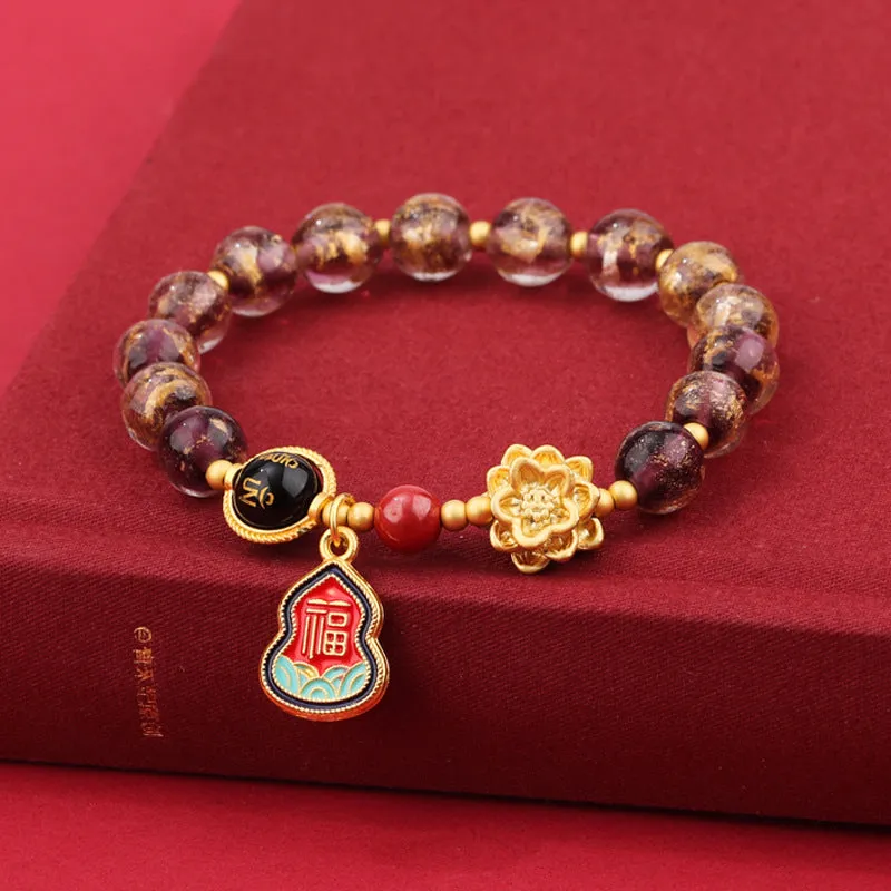 Lotus Blessing Card bracelet with 8mm glass beads, fragrant grey glaze, and gold foil electroplated accents