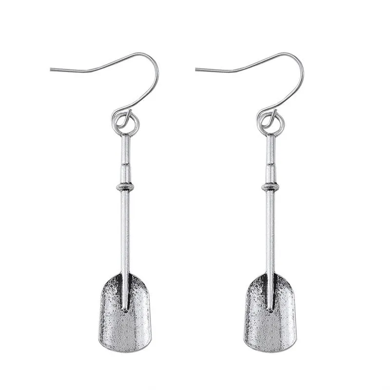 Long geometric shovel-shaped earrings with ancient silver finish and ethnic styling