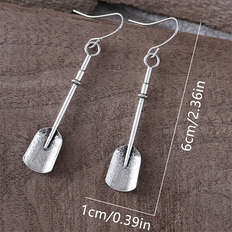 Long geometric shovel-shaped earrings with ancient silver finish and ethnic styling