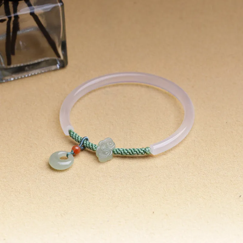 Green agate and Hetian jade bracelet with Xiangyun motifs on elasticated band