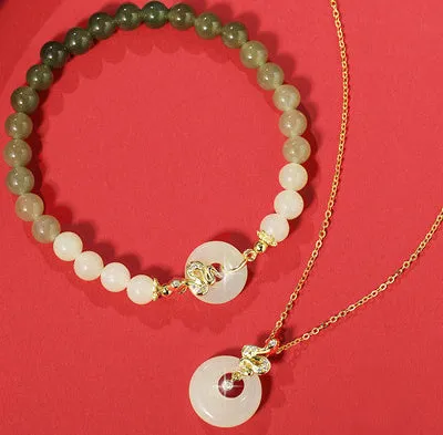 Peach blossom Hetian jade bracelet and necklace set with flower-shaped beads in sterling silver setting