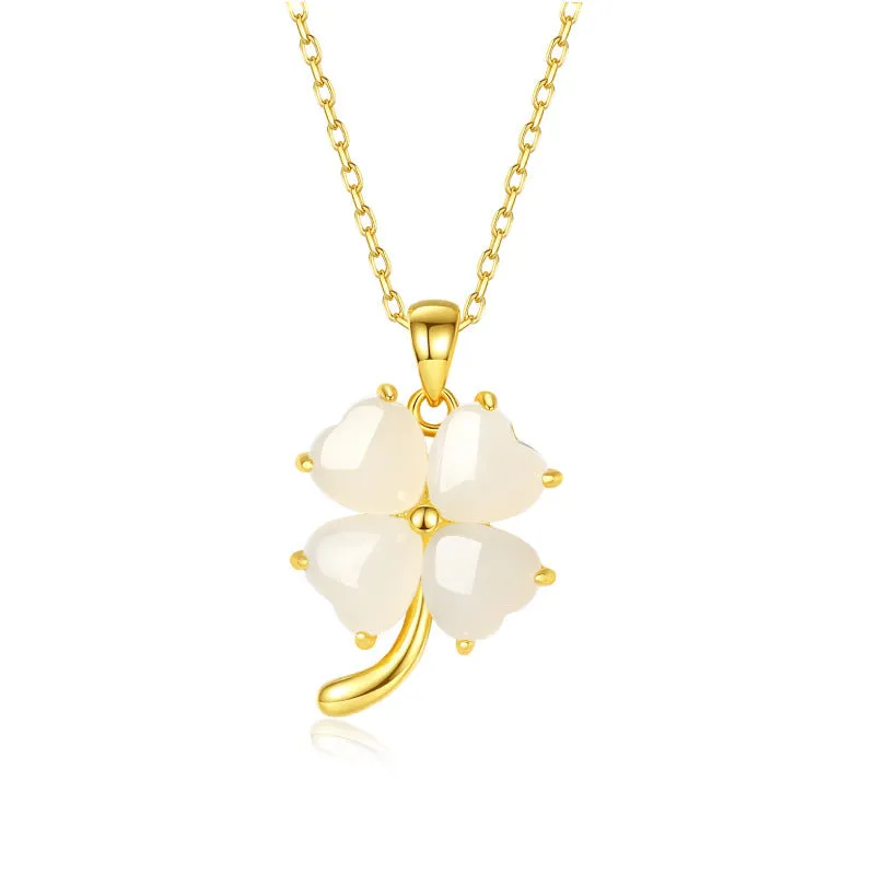Women's four-leaf clover necklace with Hetian jade pendant on an adjustable sterling silver chain.