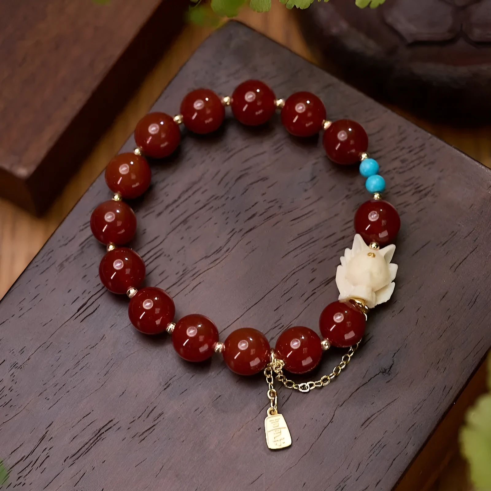 Red agate and ivory nut bracelet with 10mm beads and Fengjiu design in retro style