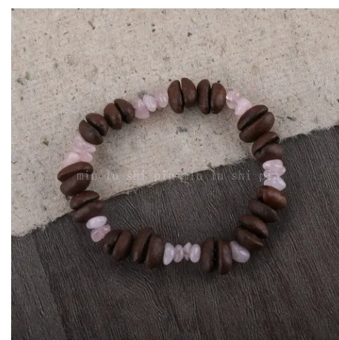 Handmade coffee bean bracelet with 16mm geometric charm showing colour variations