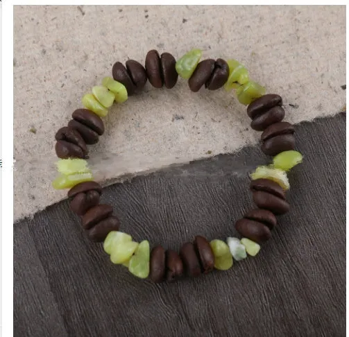 Handmade coffee bean bracelet with 16mm geometric charm showing colour variations