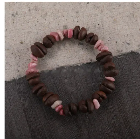 Handmade coffee bean bracelet with 16mm geometric charm showing colour variations