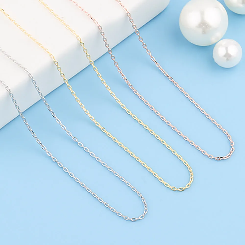Stainless steel necklace with a U-shaped pendant on a chain, shown in steel, gold, and rose gold colour options.
