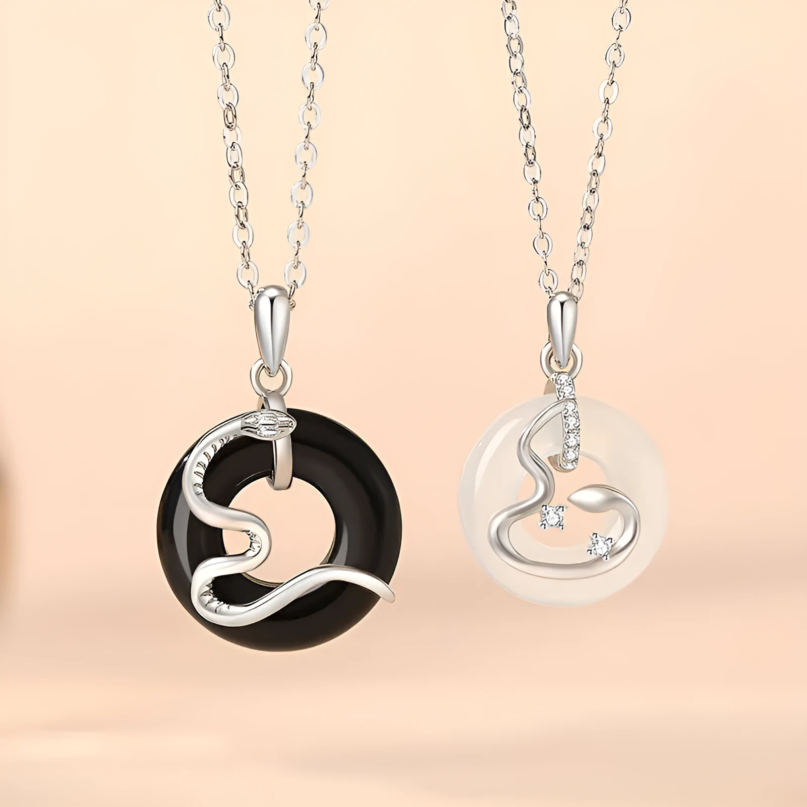 925 sterling silver snake couple necklace with Peace buckle on black background