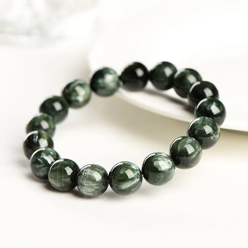 Green Dragon Crystal bracelet with 8-9mm geometric round beads and Ruyi design.