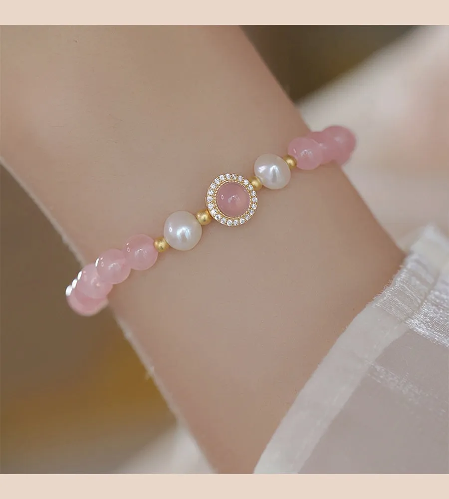 Ladies copper bracelet with Taoji pink crystal beads in natural style on display