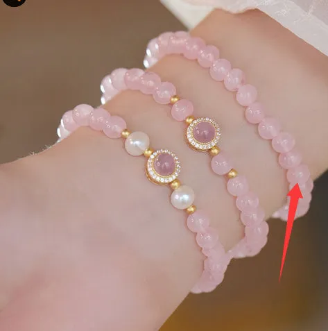 Ladies copper bracelet with Taoji pink crystal beads in natural style on display