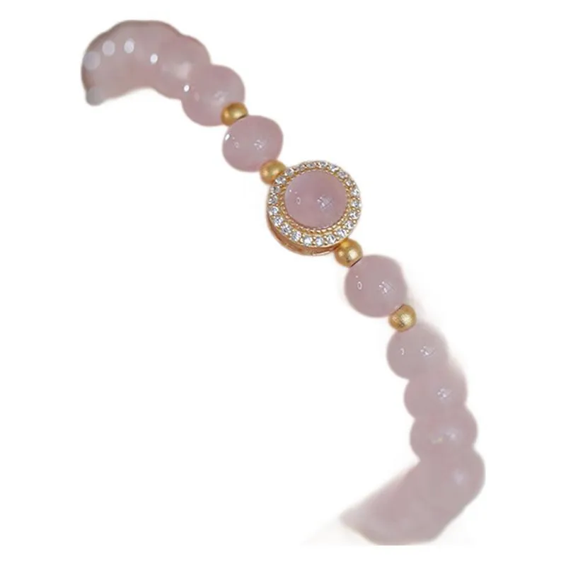 Ladies copper bracelet with Taoji pink crystal beads in natural style on display