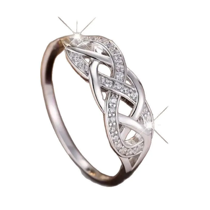 Multi-layer winding hollow geometric twist ring in white gold finish with inlaid zircon, copper base, sizes No 6 to No 10