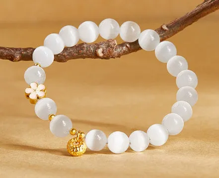 Sterling silver character fu bag bracelet with cold enamel peach blossom opal, flower shape, Gray Island Peach Blossom style, on white background