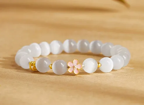 Sterling silver character fu bag bracelet with cold enamel peach blossom opal, flower shape, Gray Island Peach Blossom style, on white background