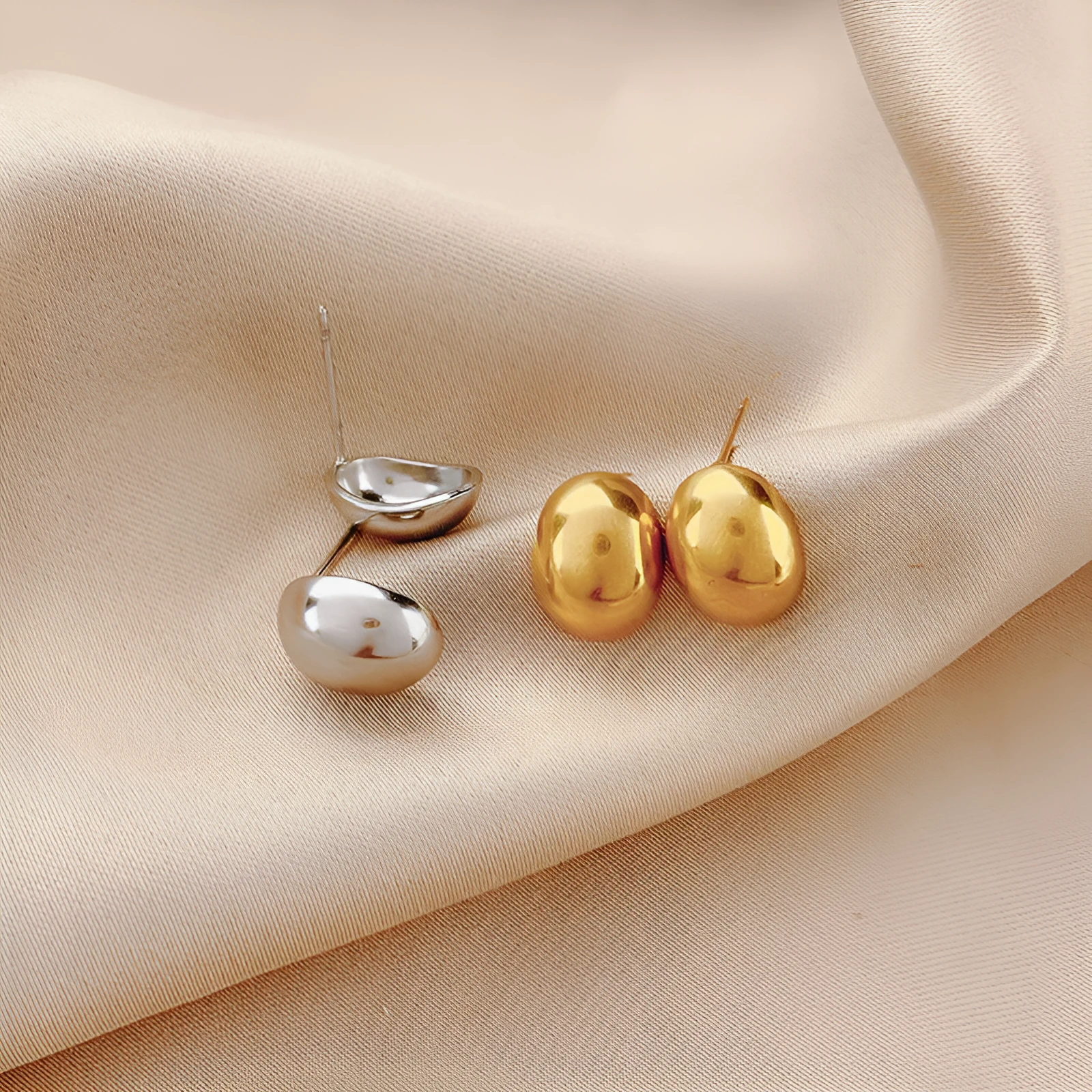 French refined Doudou water drop titanium steel ear studs in gold real gold plating affordable luxury style