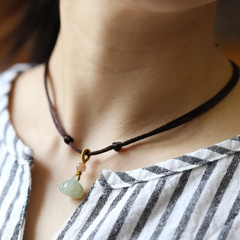 Natural Hetian jade short necklace with lotus seedpod pendant on green rope, handmade simple style