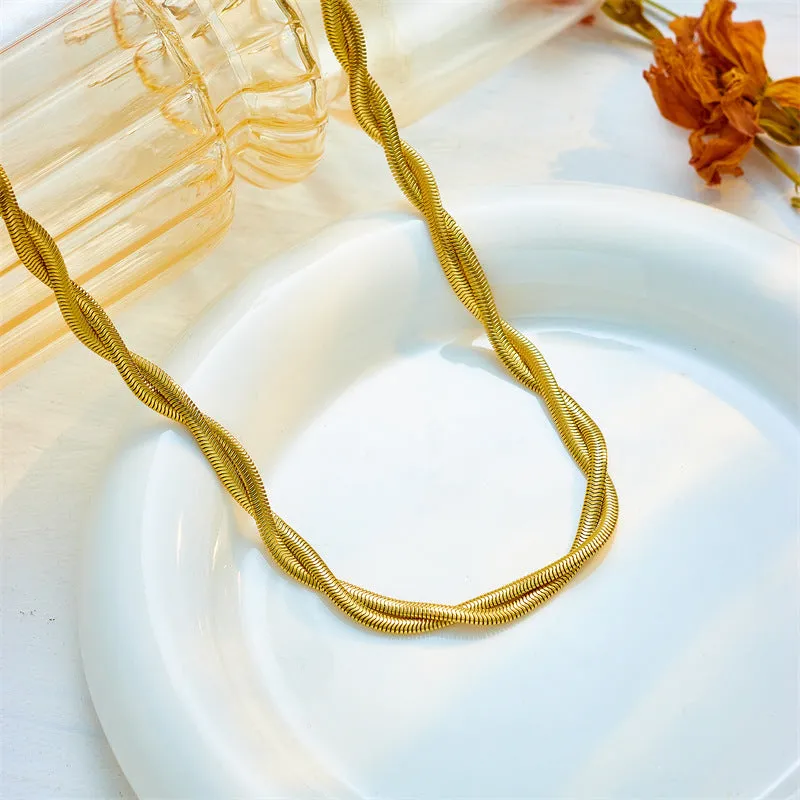 Simple neutral woven twisted gold-plated necklace and bracelet set on titanium steel chain