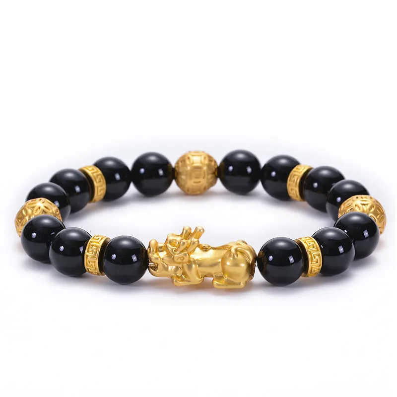 Unisex natural black agate stone bracelet with imitation gold accent, round bead design