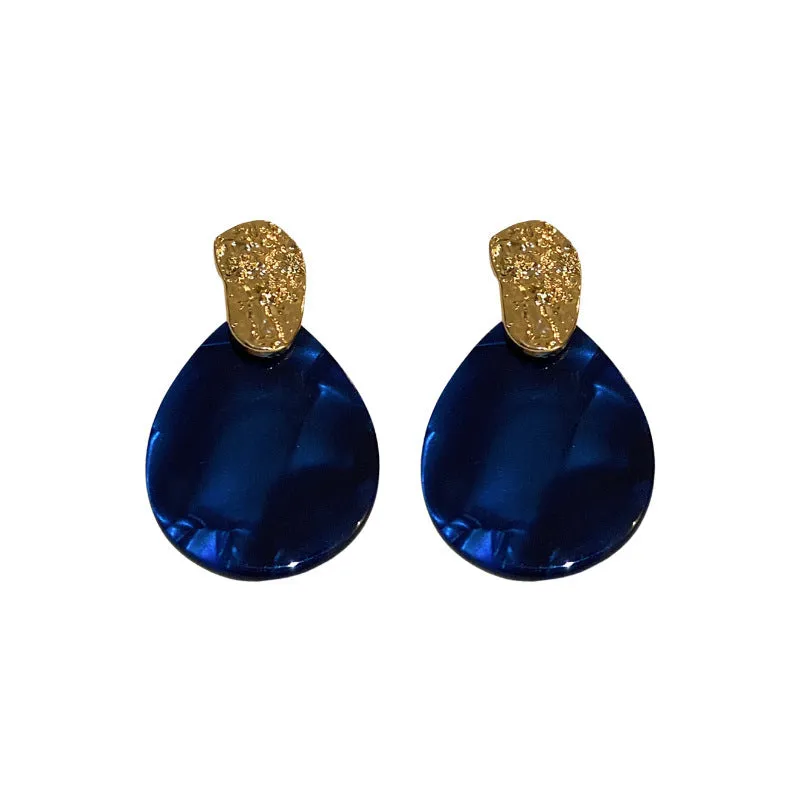Silver Needle blue acrylic water drop ear studs with pleated texture on white background