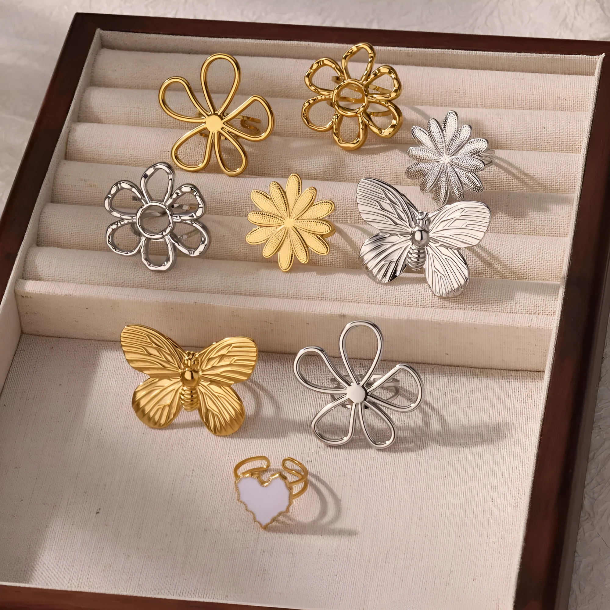 Stainless steel open mouth hollow flower ring for women in gold finish