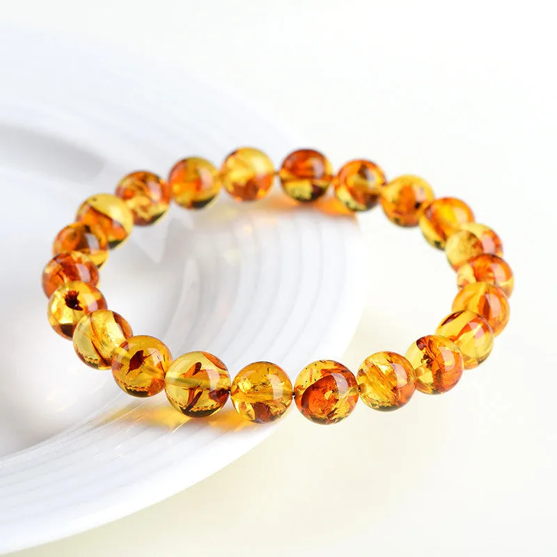 Natural yellow piebald amber bracelet with geometric polished beads for water purification