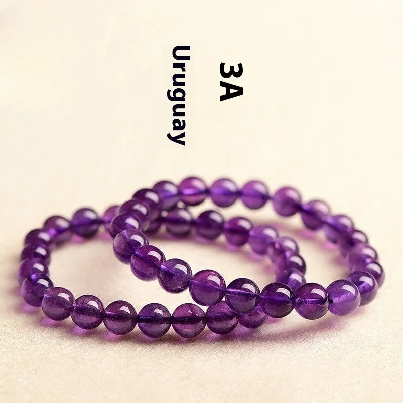 Natural amethyst Uruguay bracelet with polished purple beads, shown in single circle and triple ring designs.